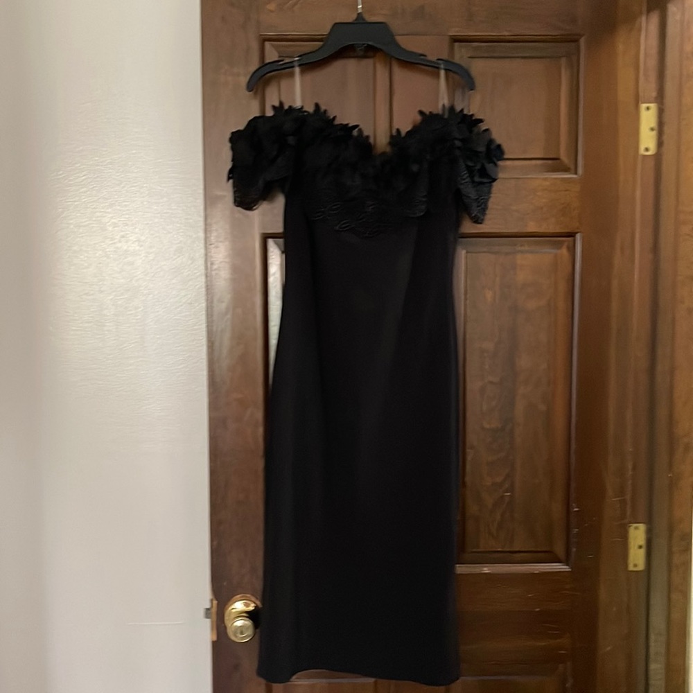 Black dress size large new with tags , size large fits like a medium!